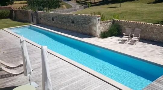 CONSTRUCTION & INSTALLATION OF A PRECONSTRUCTED SWIMMING POOL -